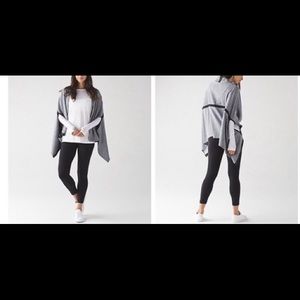 Lululemon Wrap New. Scarf with arm openings.